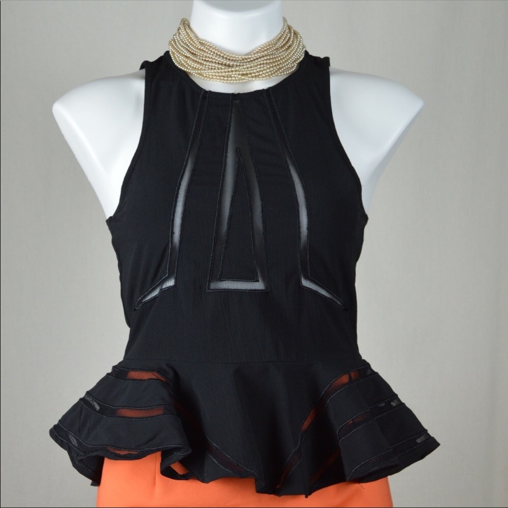 Adorable Black Cutout Peplum Top
